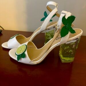 Katy Perry sandals with acrylic heels.